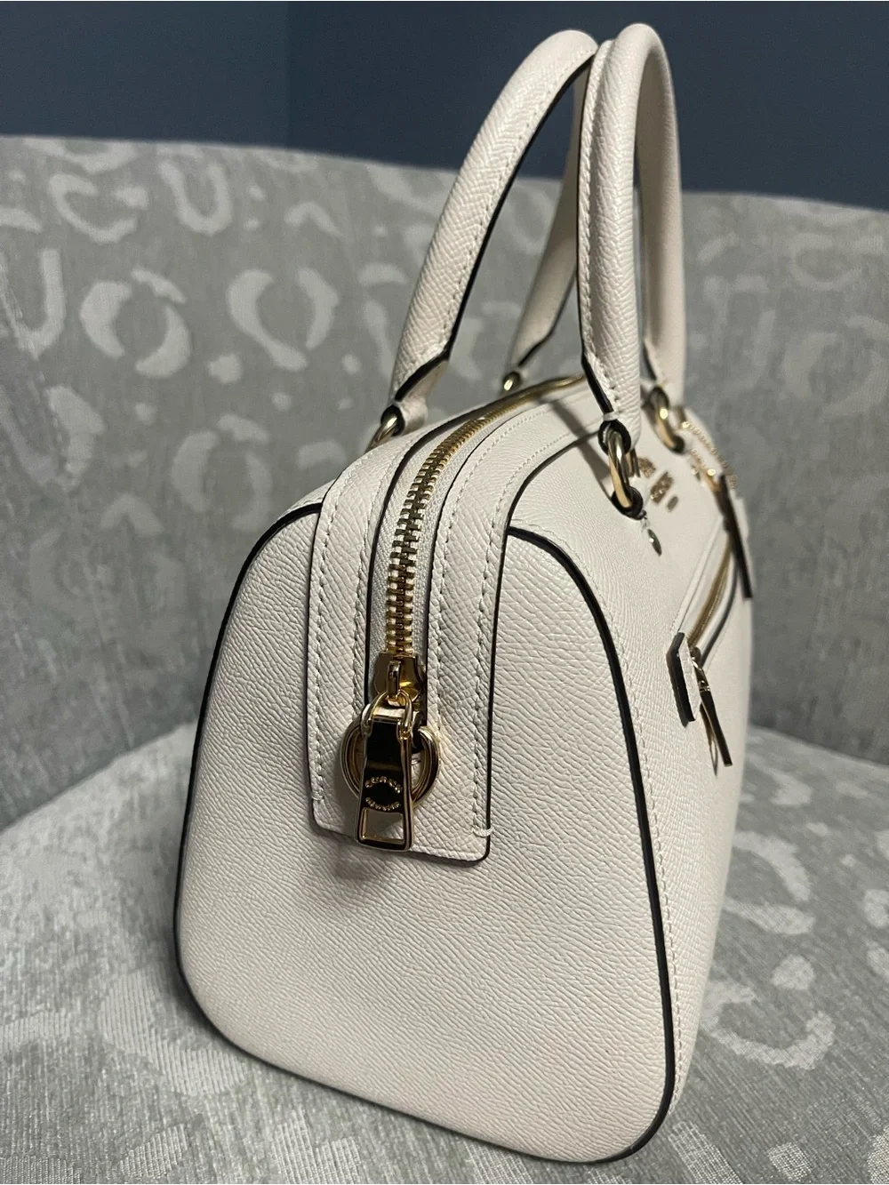 Coach Rowan medium in cream with gold hardware.